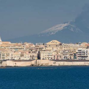 Cityscape of Sycracuse with Etna in the background, Sicily, Italy